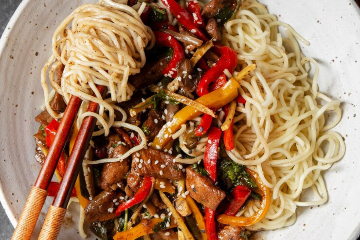 Asian Beef Lo Mein Recipe - A visual guide to crafting homemade perfection in a bowl.